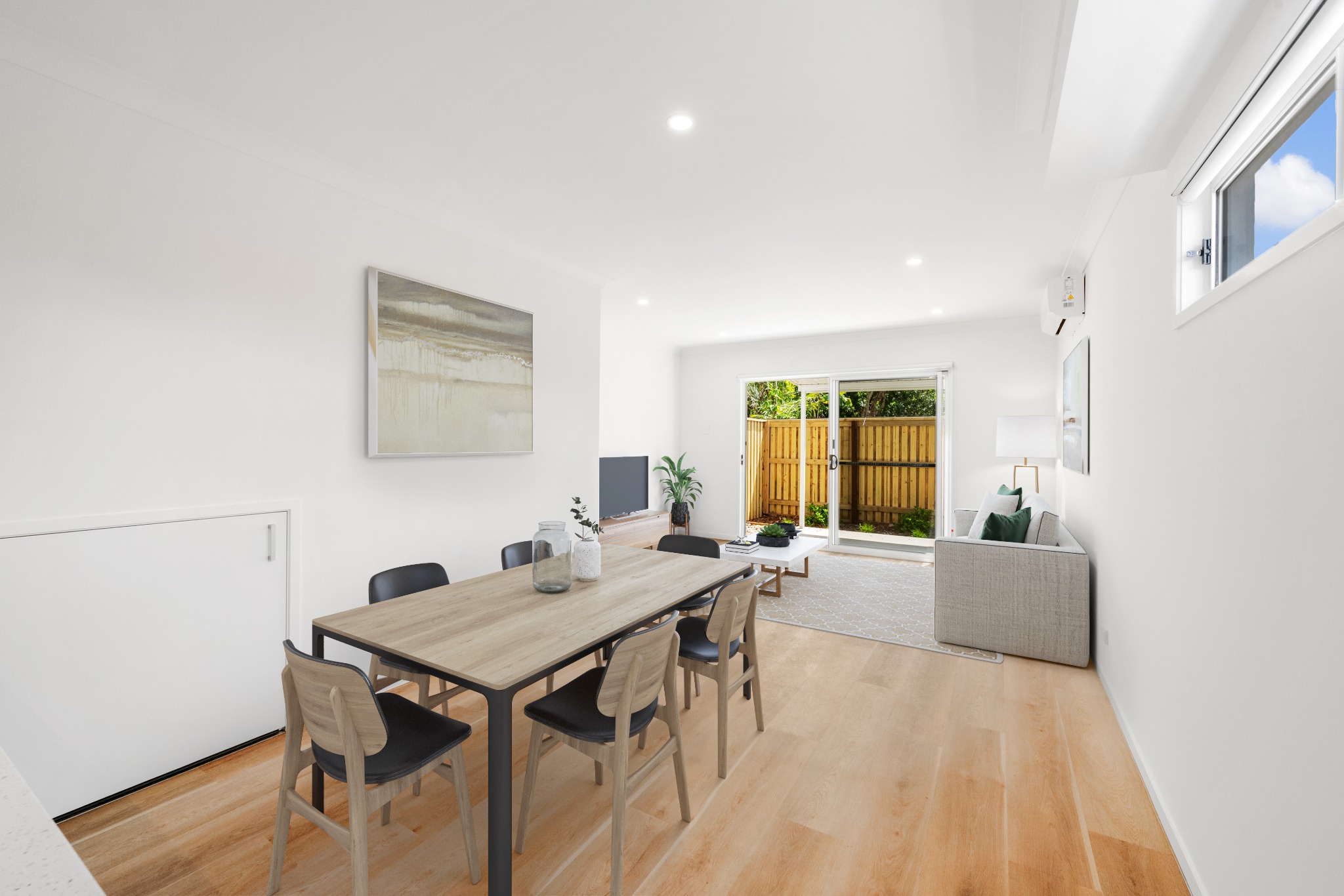 Open-plan townhouse living and dining area